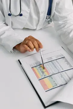 Physician reviewing metabolic assessment with patient