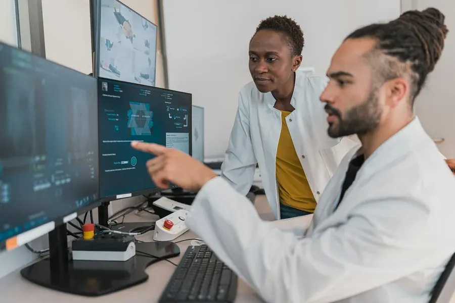 Physician reviewing diabetes lab report with patient