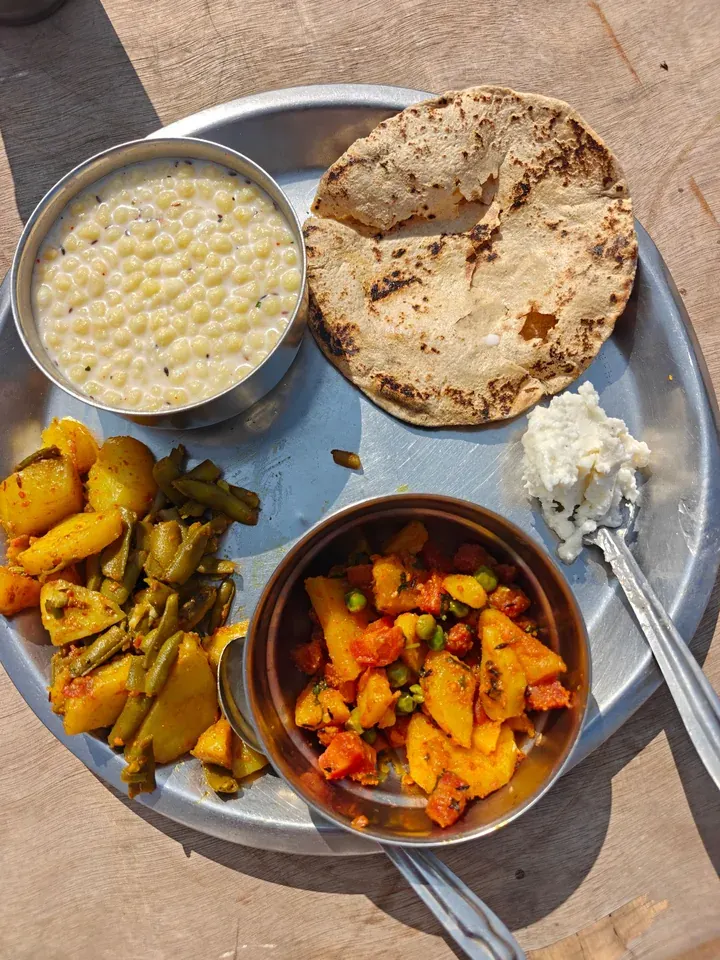Traditional Indian thali with roti, dal, and sabzi